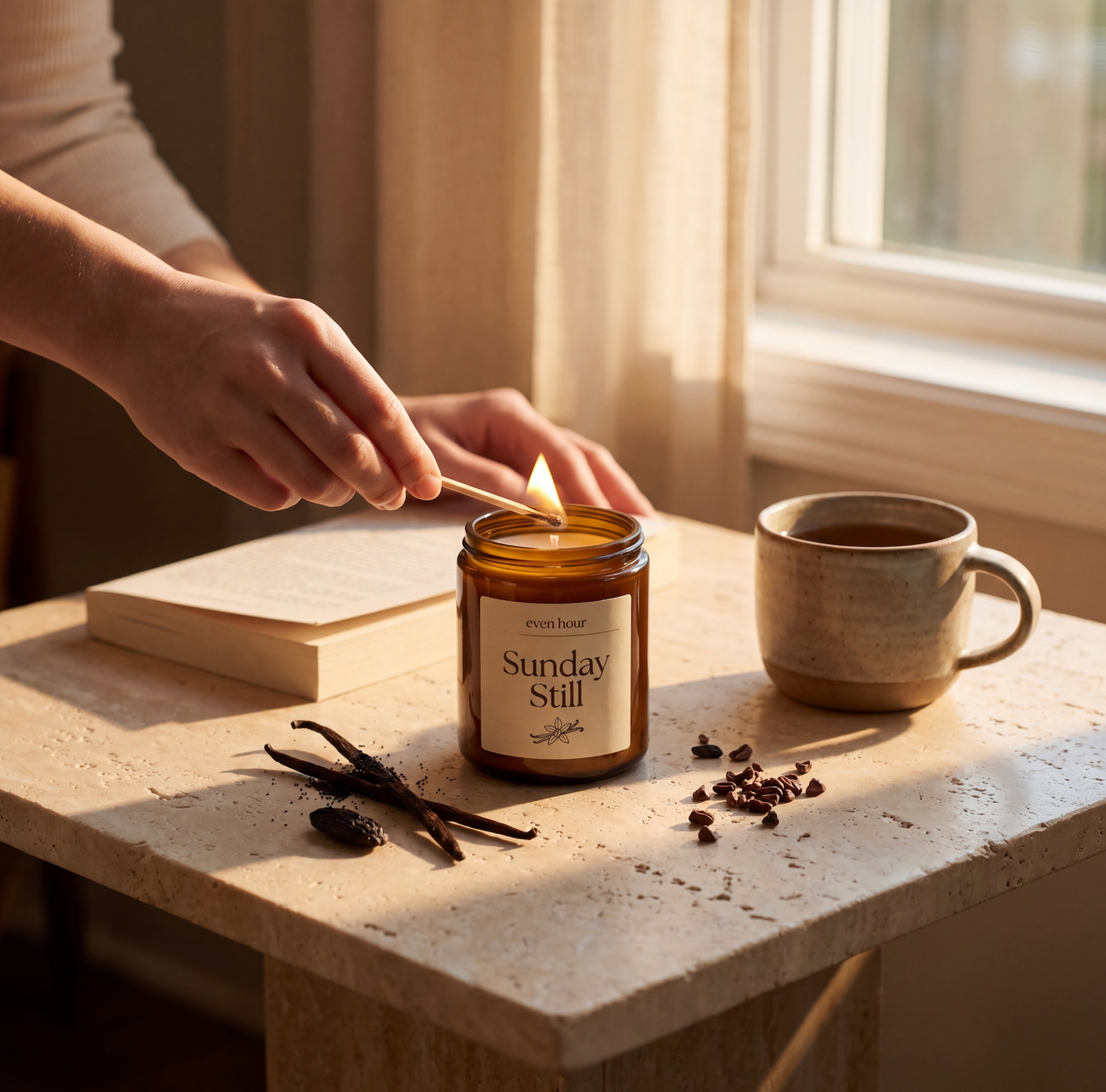Even Hour Sunday Still candle being lit beside a book and ceramic mug in soft window light
